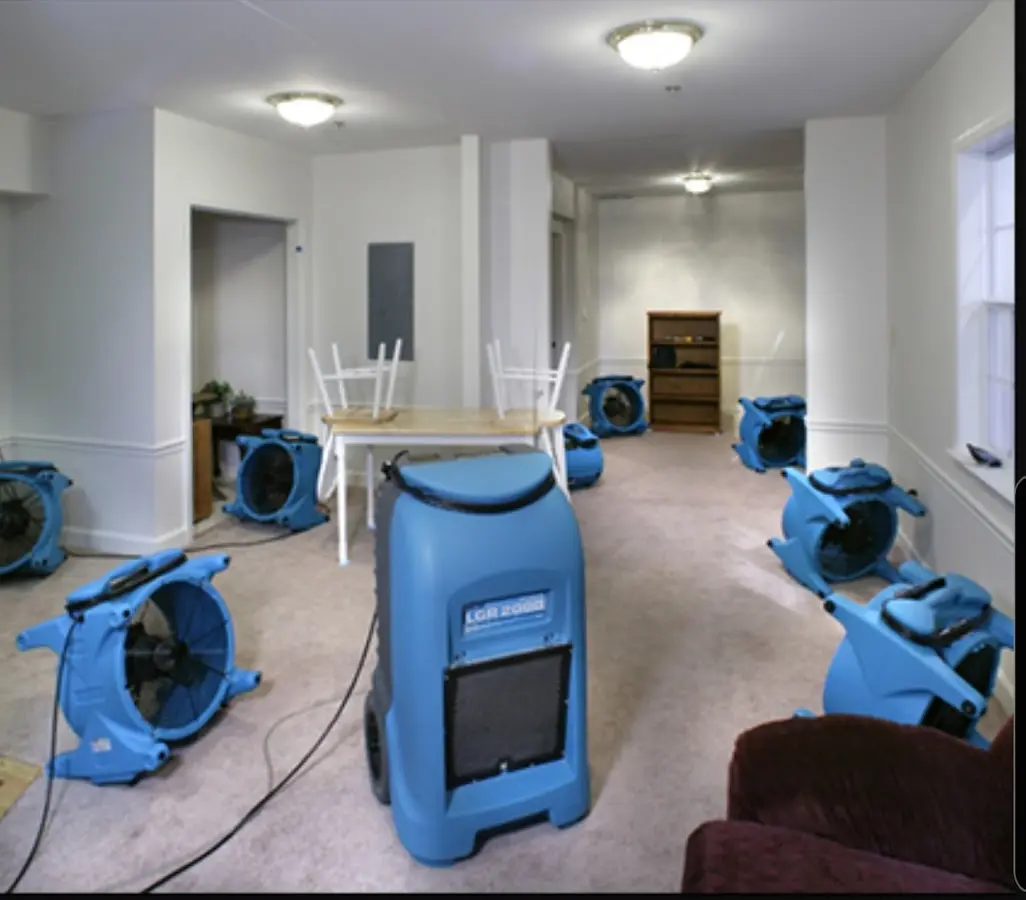 Air movers and dehumidifier setup for Water Extraction & Removal in McCook